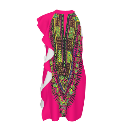 A bright pink dashiki dress featuring a large, vibrant African wax print pattern in green, yellow, black, and white on the front panel, with layered ruffle details along the side.