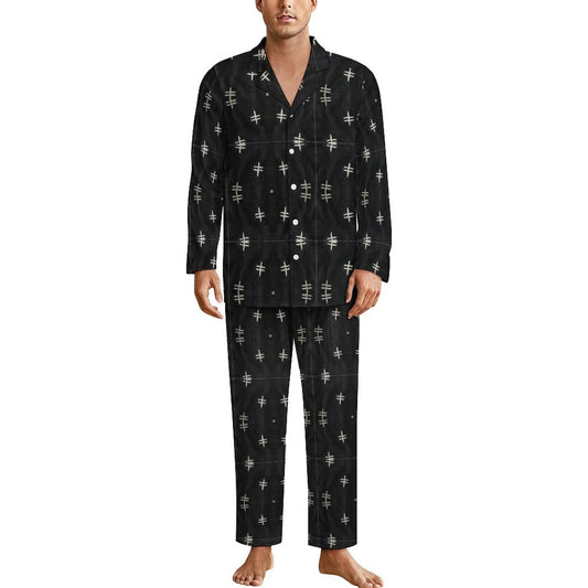 man wearing a set of sleep wears in black and white bogolan motif